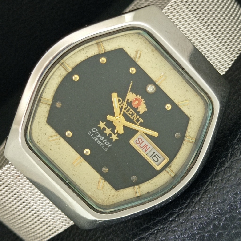 Vintage 1981 Orient Automatic Mens Silver Watch WDaydate  Gold Accents